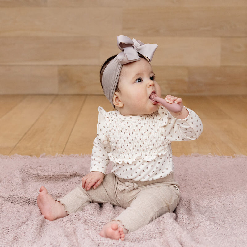 ezpz baby led toothbrush and sensory tongue depressor in blush pink #color_blush