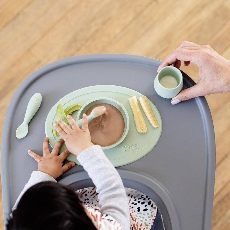 First Foods Set in Sage by ezpz / The Original All-In-One Silicone Plates & Placemats that Stick to the Table#color_sage