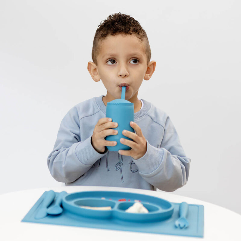 Happy Cup and Straw in Blue / Silicone Cup with Lid and Straw for Toddlers by ezpz #color_blue / Happy Cup + Straw System for Toddlers – Sip Smart, Grow Strong by ezpz