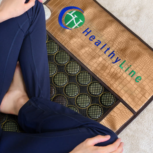 Jade and tourmaline emitting far-infrared heat and negative ions