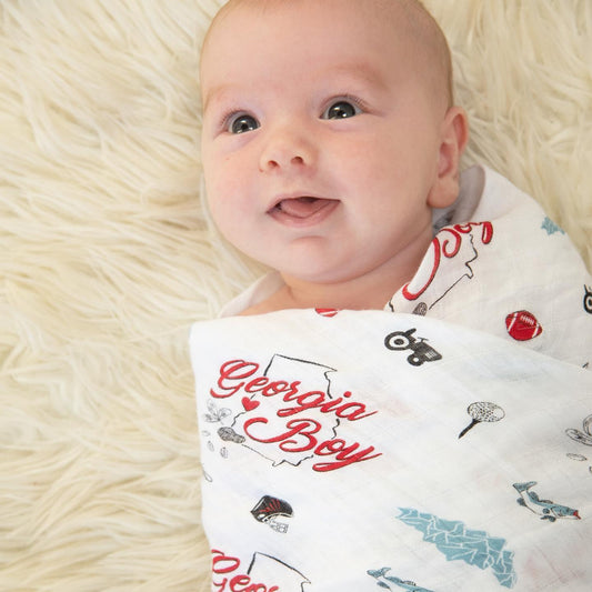 Gift set featuring a Georgia Boy muslin swaddle blanket and burp cloth/bib combo with state-themed designs.