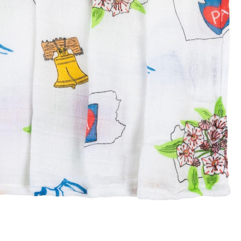 Pennsylvania-themed baby gift set with muslin swaddle blanket and burp cloth/bib combo, featuring state icons.
