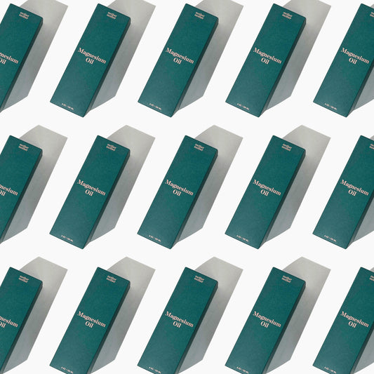 15 magnesium oil boxes on a white background with a hard shadow