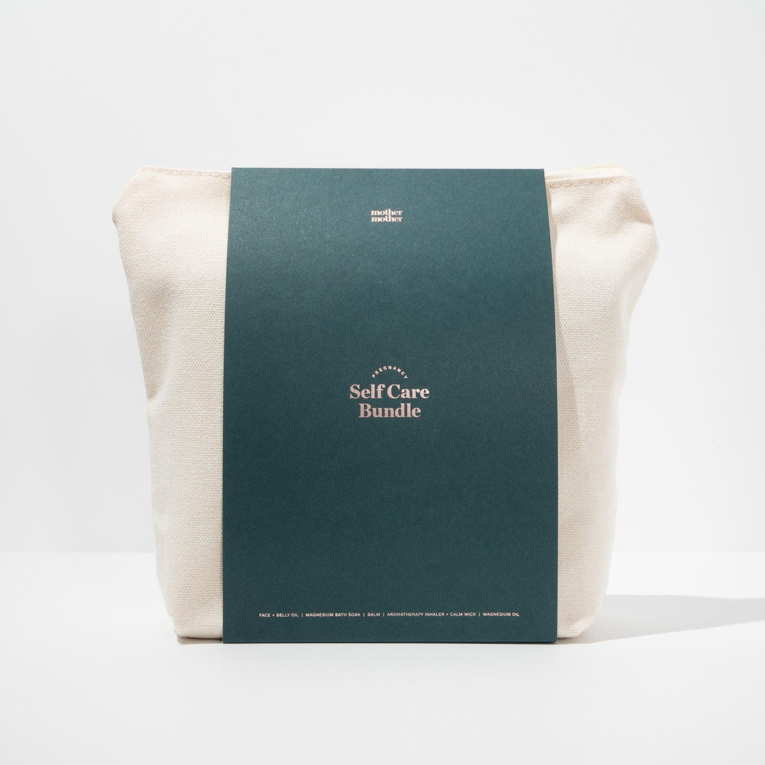 pregnancy and postpartum self care bundle in canvas bag on a white background