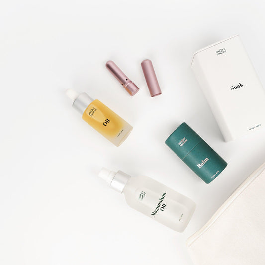 self care bundle: belly oil, magnesium il and soak, belly balm, aromatherapy inhaler on a white background