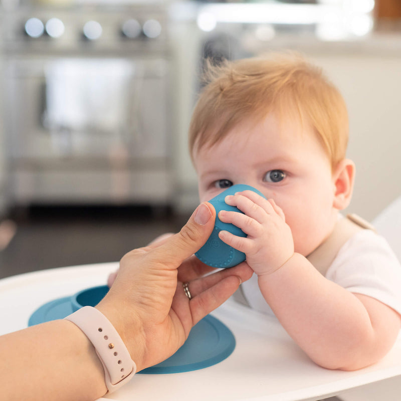The Tiny Cup in Blue by ezpz / Open-Top, Silicone Drinking Cup for Babies #color_blue