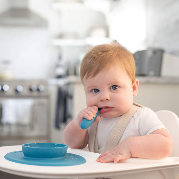The Tiny Spoon in Blue by ezpz / Small, Sensory Silicone Spoon for Babies #color_blue / Baby-Led™ Tiny Spoons – First Feeding Spoons for Independent Littles