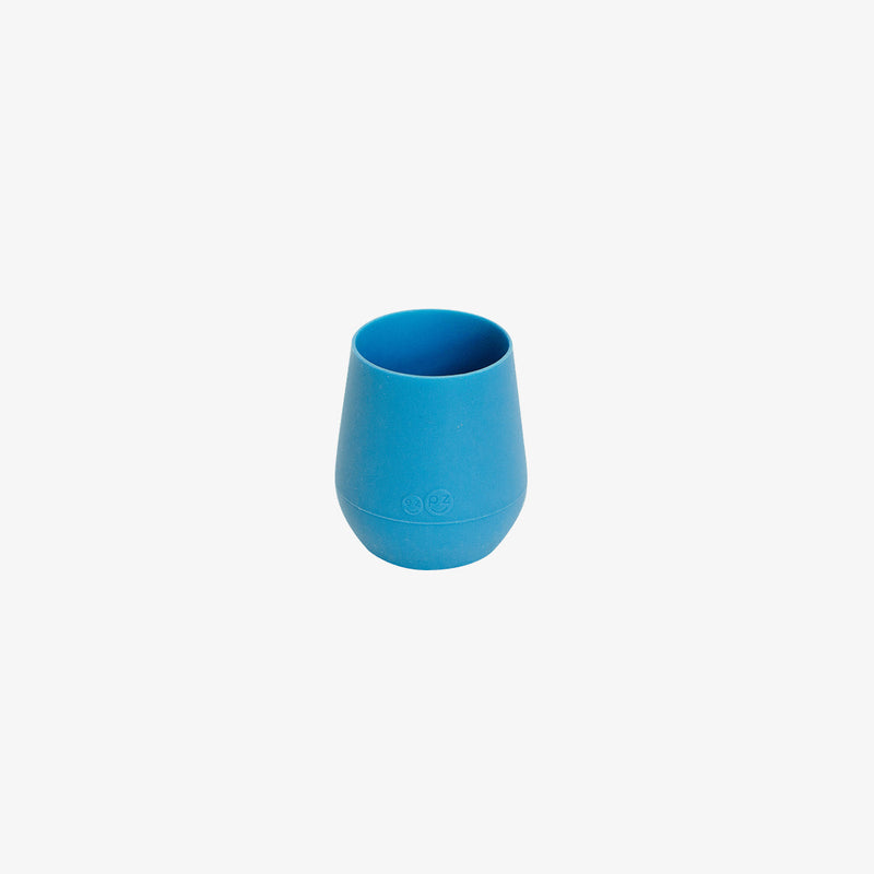 The Tiny Cup in Blue by ezpz / Open-Top, Silicone Drinking Cup for Babies #color_blue
