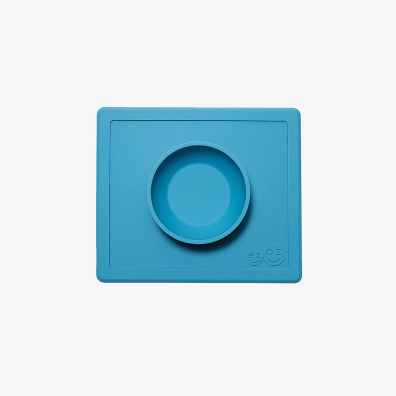 Happy Bowl in Blue by ezpz / The Original All-In-One Silicone Plates & Placemats that Stick to the Table #color_blue / Happy Bowl – Self-Feeding Made Simple for Babies & Toddlers by ezpz