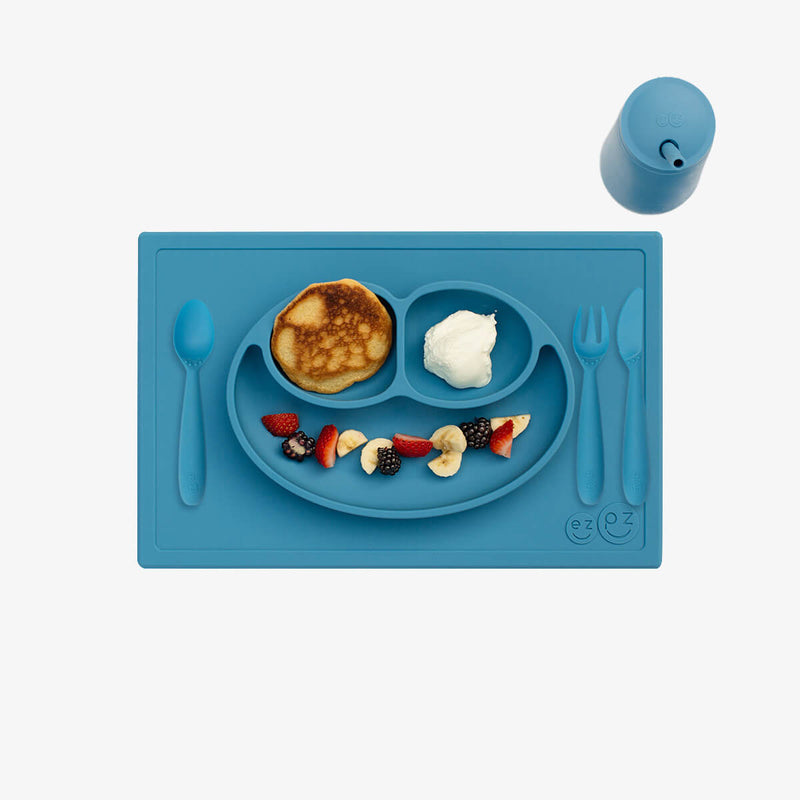 ezpz Happy Feeding Set in Blue / Silicone, Self-Suctioning Plate, Silicone Cup and Straw, Training Utensils for Toddlers #color_blue