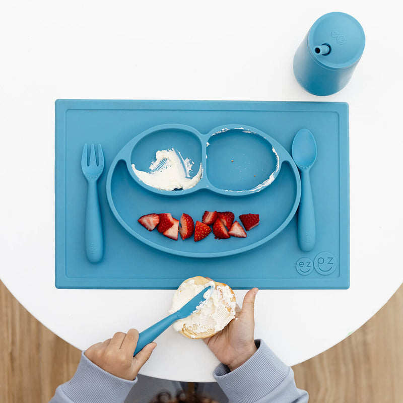 ezpz Happy Feeding Set in Blue / Silicone, Self-Suctioning Plate, Silicone Cup and Straw, Training Utensils for Toddlers #color_blue