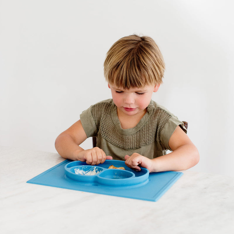Happy Mat in Blue by ezpz / The Original All-In-One Silicone Plates & Placemats that Stick to the Table #color_blue