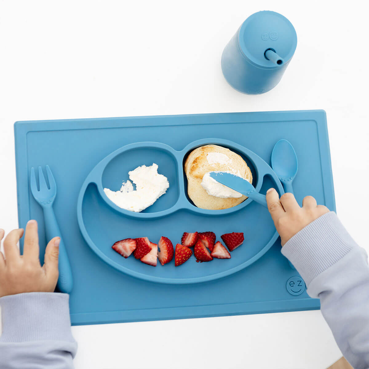Happy Utensils in Blue by ezpz / Silicone Spoon, Fork and Knife Set for Kids #color_blue