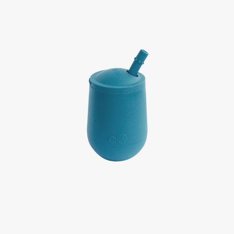 The Mini Cup + Straw in Blue by ezpz / Silicone Drinking Cup and Straw Training System for Toddlers #color_blue