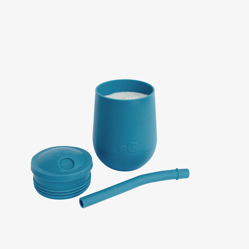 The Mini Cup + Straw in Blue by ezpz / Silicone Drinking Cup and Straw Training System for Toddlers #color_blue