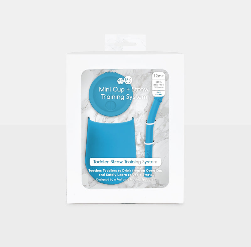The Mini Cup + Straw in Blue by ezpz / Silicone Drinking Cup and Straw Training System for Toddlers #color_blue