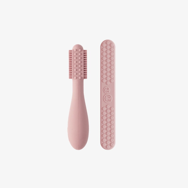 ezpz baby led toothbrush and sensory tongue depressor in blush pink #color_blush