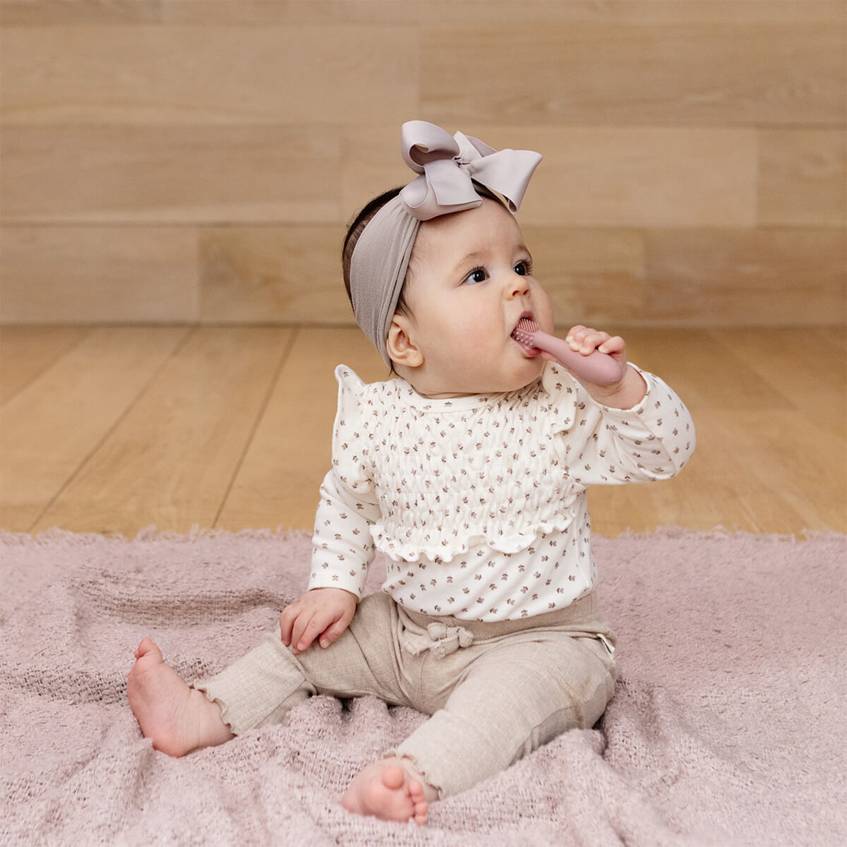ezpz baby led toothbrush and sensory tongue depressor in blush pink #color_blush