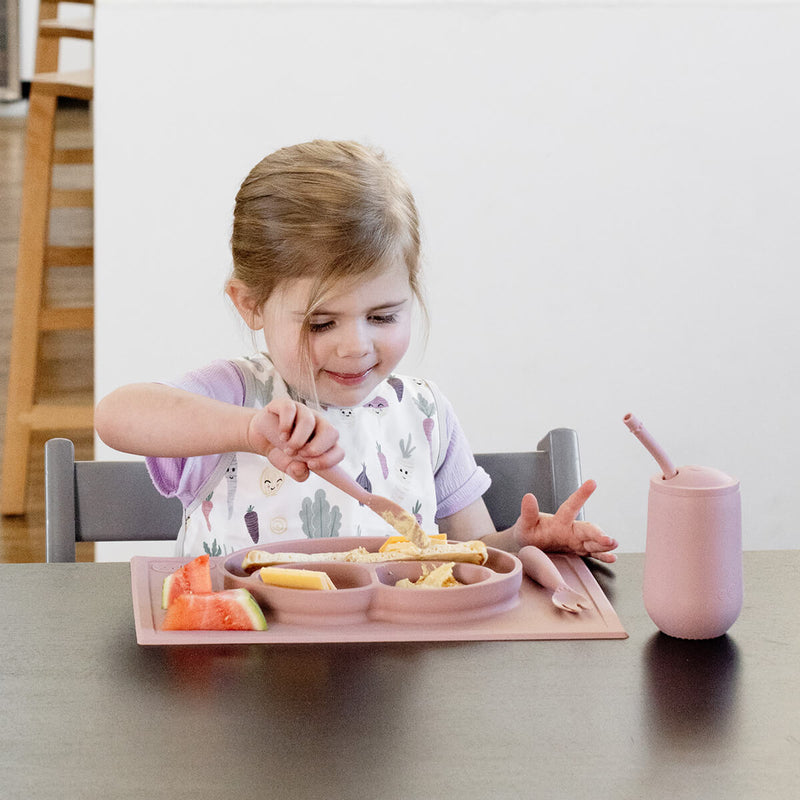 ezpz Happy Feeding Set in Blush / Silicone, Self-Suctioning Plate, Silicone Cup and Straw, Training Utensils for Toddlers #color_blush