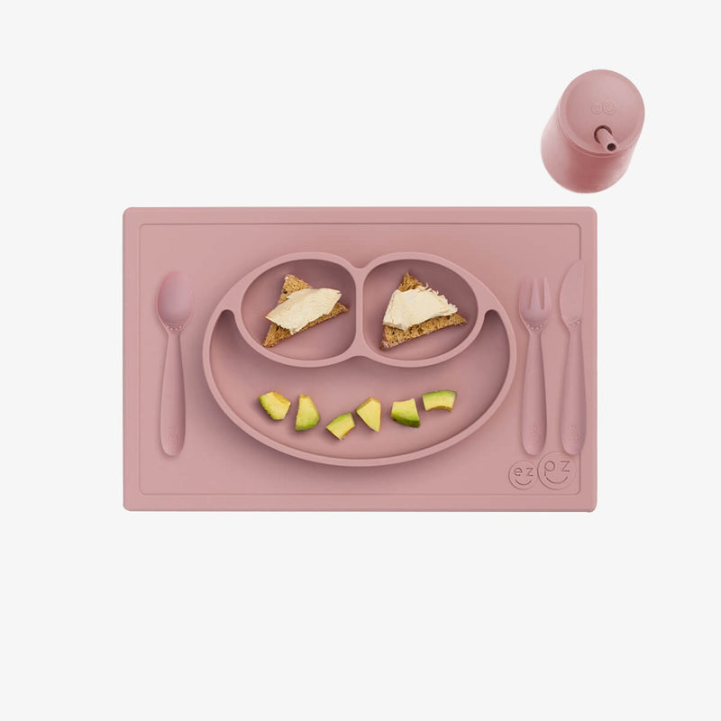 ezpz Happy Feeding Set in Blush / Silicone, Self-Suctioning Plate, Silicone Cup and Straw, Training Utensils for Toddlers #color_blush