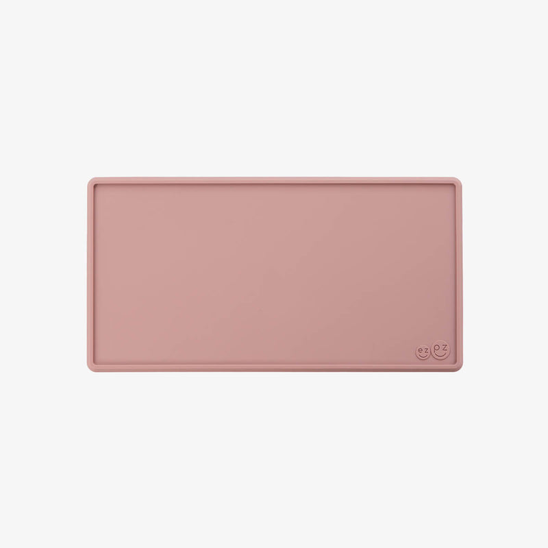 The Tiny Placemat in Blush is a non-slip, silicone placemat that fits on most highchair trays #color_blush / Tiny Placemat – On-the-Go Mealtime Mat for Babies & Toddlers