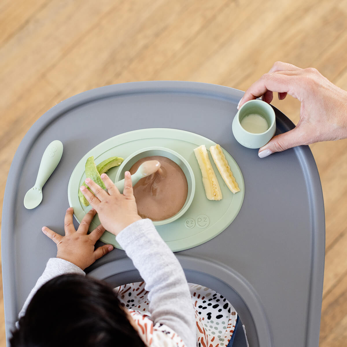 First Foods Set in Sage by ezpz / The Original All-In-One Silicone Plates & Placemats that Stick to the Table#color_sage
