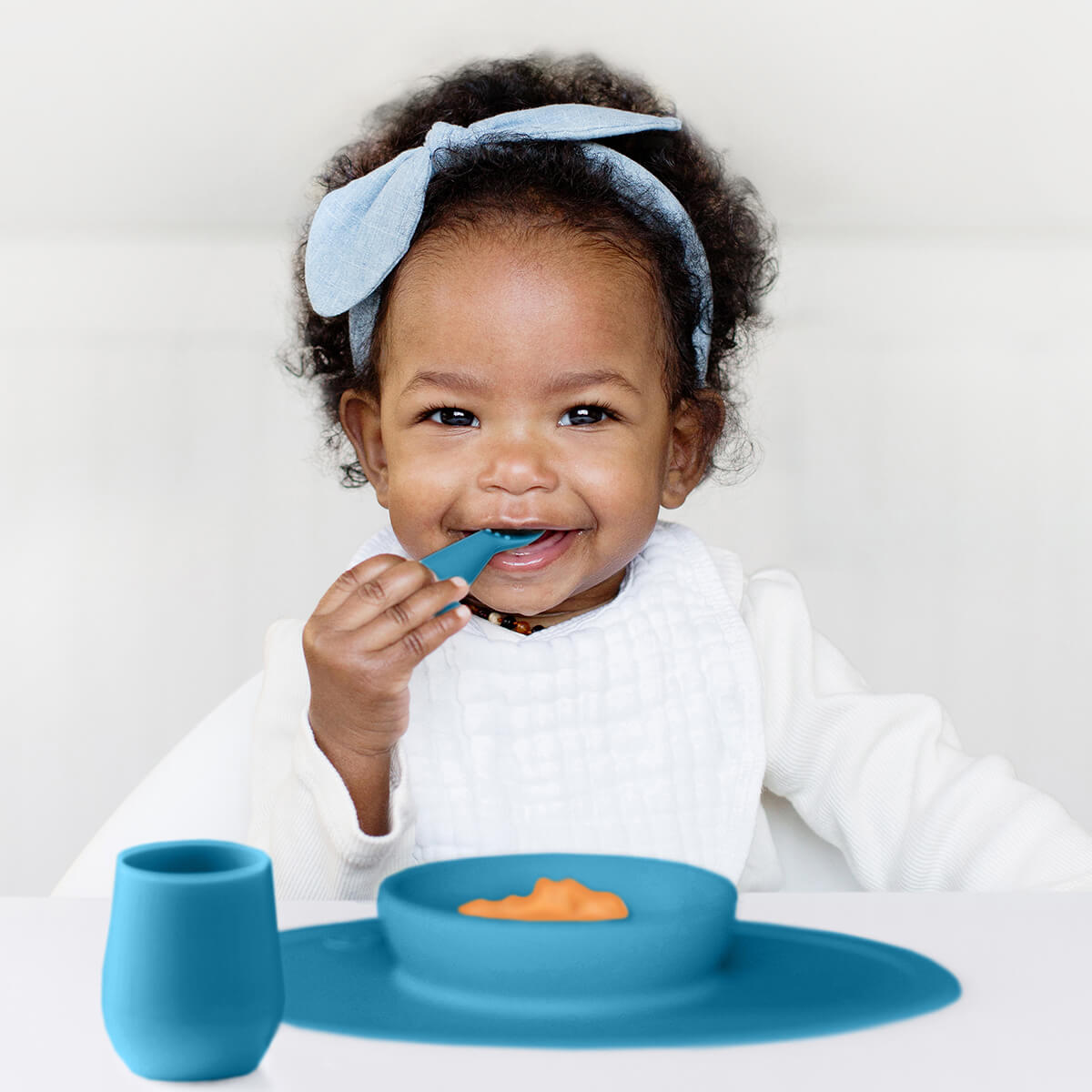 First Foods Set in Blue by ezpz / The Original All-In-One Silicone Plates & Placemats that Stick to the Table#color_blue