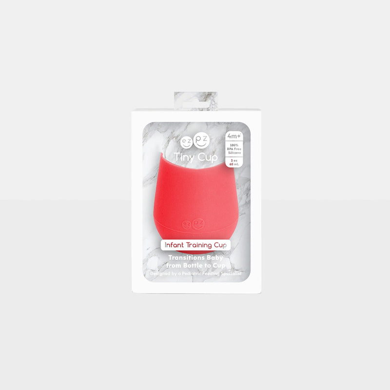 The Tiny Cup in Coral by ezpz / Open-Top, Silicone Drinking Cup for Babies #color_coral