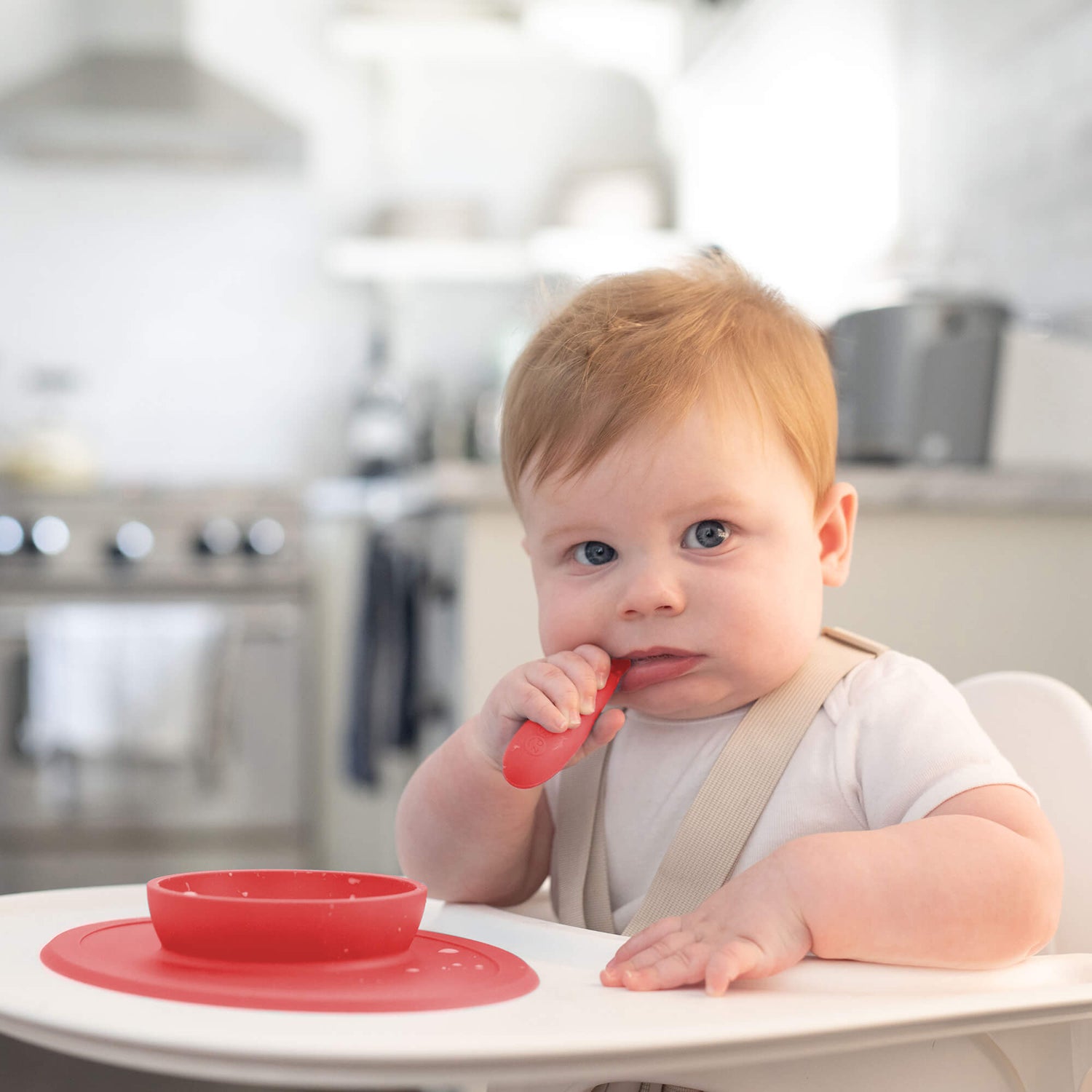 The Tiny Spoon in Coral by ezpz / Small, Sensory Silicone Spoon for Babies #color_coral / Coral Baby-Led™ Tiny Spoons – First Feeding Spoons for Independent Littles 