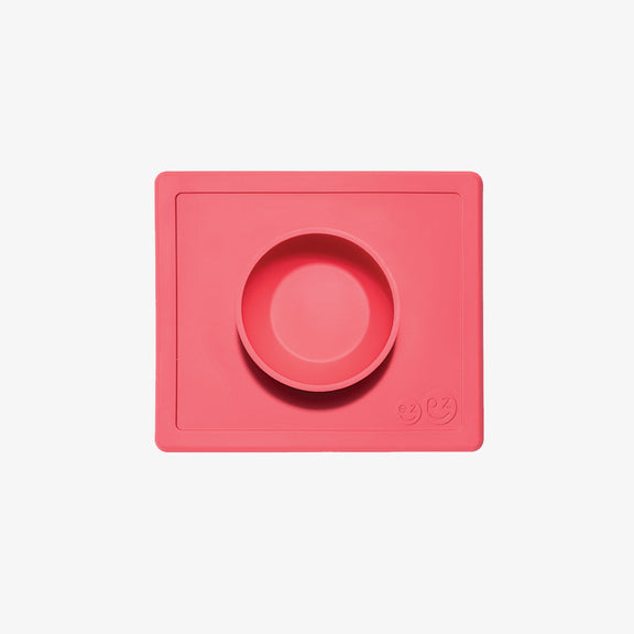 Happy Bowl in Coral by ezpz / The Original All-In-One Silicone Plates & Placemats that Stick to the Table #color_coral / Happy Bowl – Self-Feeding Made Simple for Babies & Toddlers by ezpz