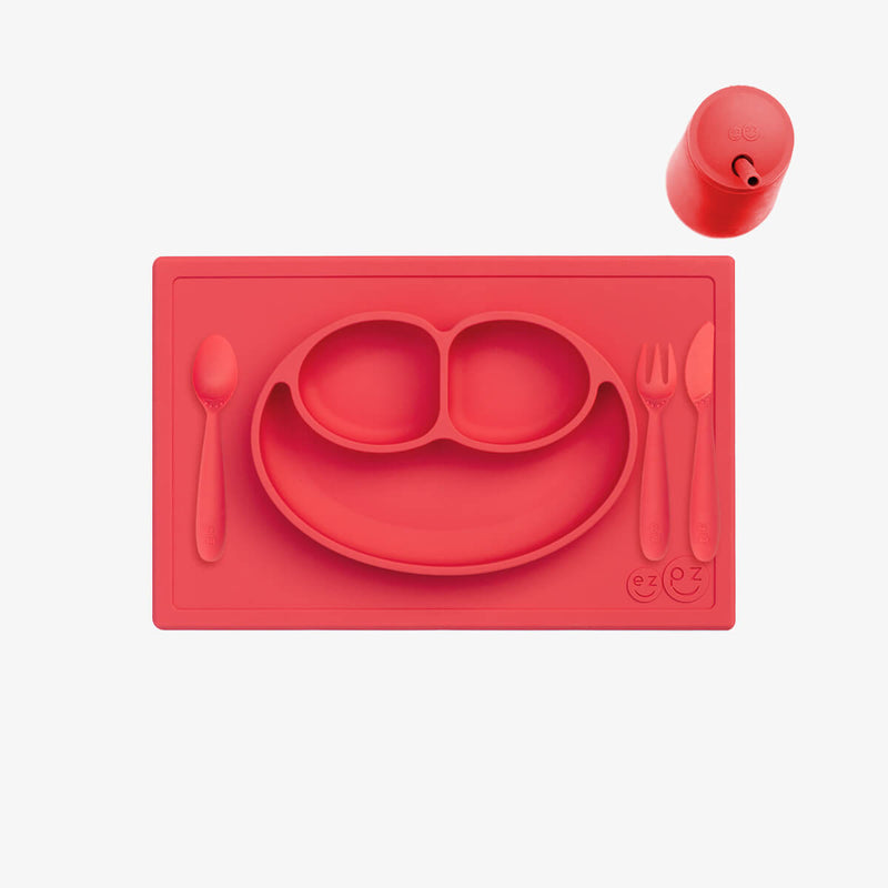 ezpz Happy Feeding Set in Coral / Silicone, Self-Suctioning Plate, Silicone Cup and Straw, Training Utensils for Toddlers #color_coral