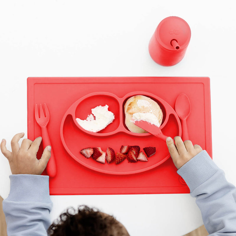 ezpz Happy Feeding Set in Coral / Silicone, Self-Suctioning Plate, Silicone Cup and Straw, Training Utensils for Toddlers #color_coral
