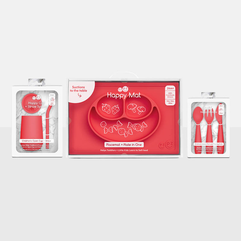ezpz Happy Feeding Set in Coral / Silicone, Self-Suctioning Plate, Silicone Cup and Straw, Training Utensils for Toddlers #color_coral