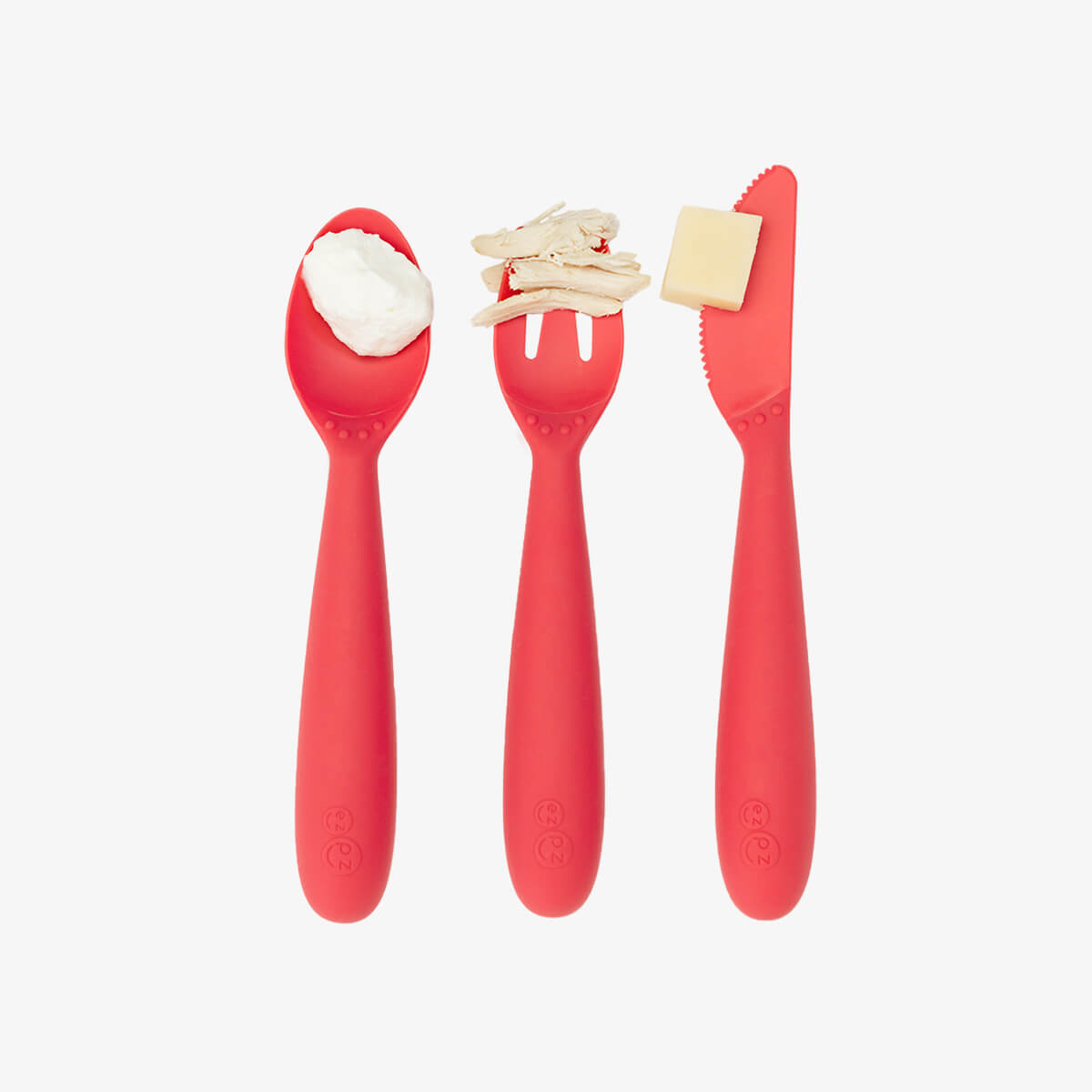 Happy Utensils in Coral by ezpz / Silicone Spoon, Fork and Knife Set for Kids #color_coral