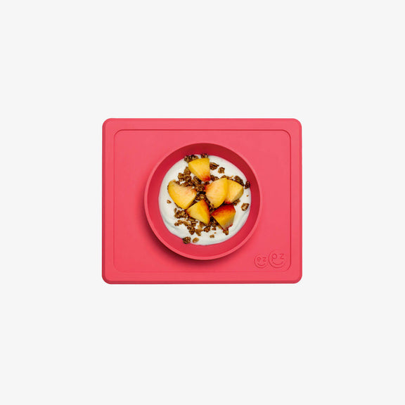 Mini Bowl in Coral by ezpz / The Original All-In-One Silicone Plates & Placemats that Stick to the Table #color_coral