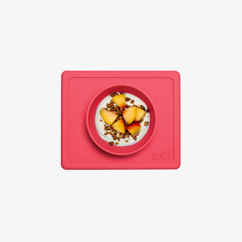 Mini Bowl in Coral by ezpz / The Original All-In-One Silicone Plates & Placemats that Stick to the Table #color_coral