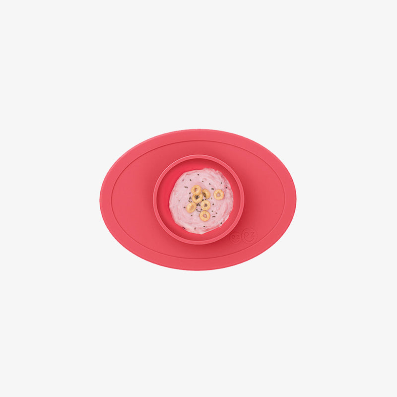 The Tiny Bowl in Coral by ezpz / Silicone Bowl for Babies that Fits on High Chairs #color_coral