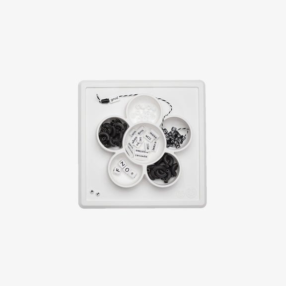 The Mini Play Mat in Cream by ezpz / Modern Silicone Craft Plate that Suctions to the Table #color_cream
