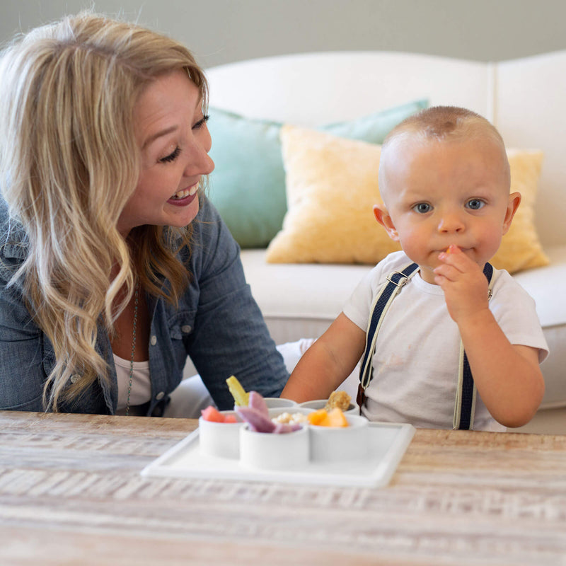 The Mini Play Mat in Cream by ezpz / Modern Silicone Craft Plate that Suctions to the Table #color_cream