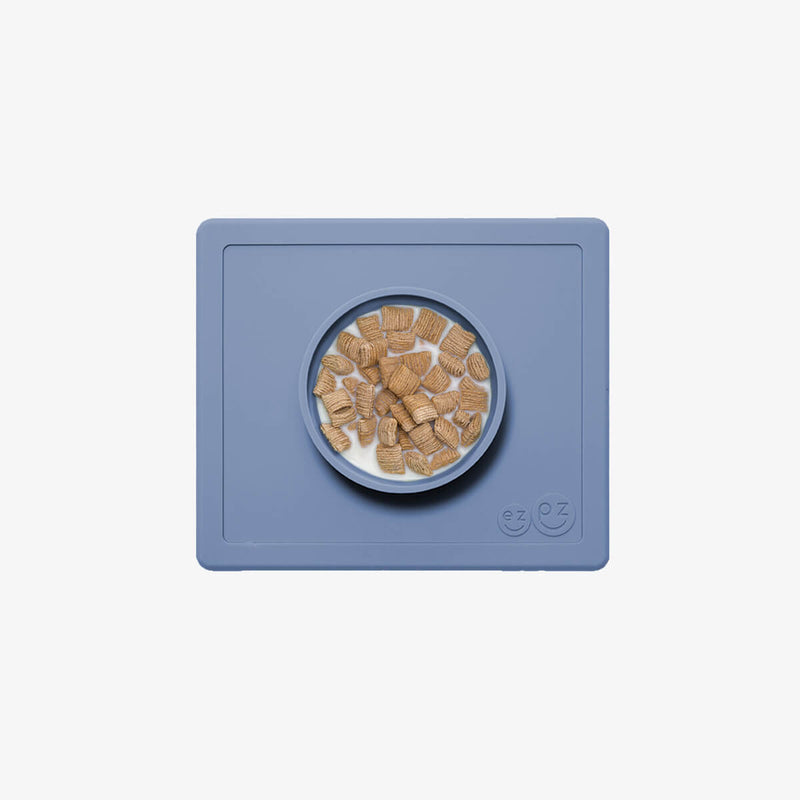 Happy Bowl in Indigo by ezpz / The Original All-In-One Silicone Plates & Placemats that Stick to the Table #color_indigo / Happy Bowl – Self-Feeding Made Simple for Babies & Toddlers by ezpz