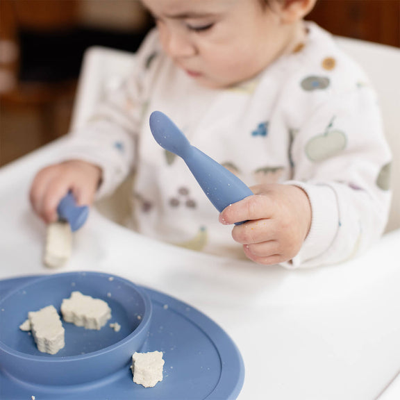 The Tiny Spoon in Indigo by ezpz / Small, Sensory Silicone Spoon for Babies #color_indigo / Indigo Baby-Led™ Tiny Spoons – First Feeding Spoons for Independent Littles 
