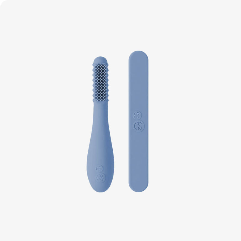 ezpz baby led toothbrush and sensory tongue depressor in indigo blue #color_indigo