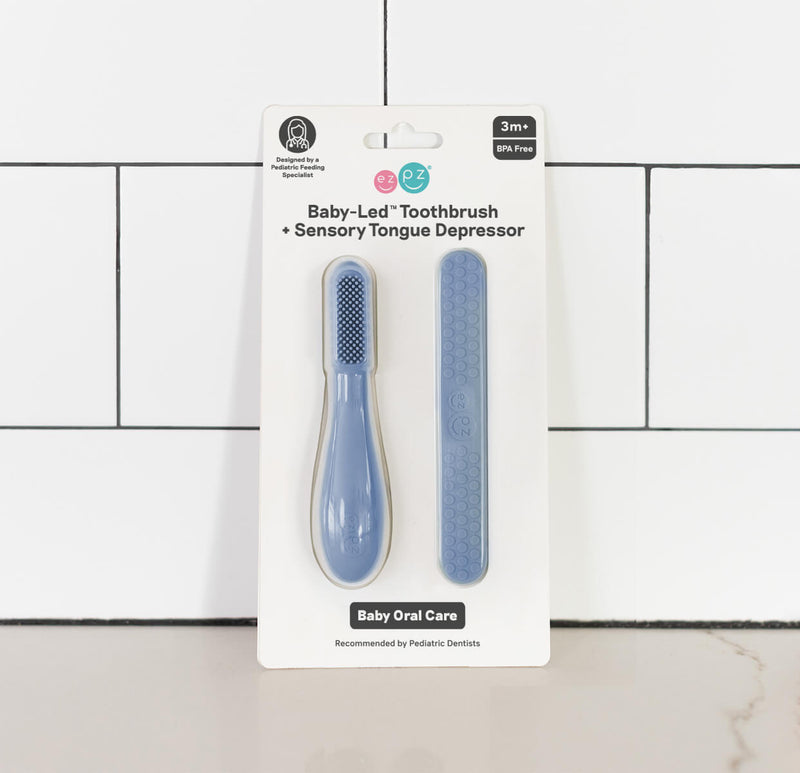 ezpz baby led toothbrush and sensory tongue depressor in indigo blue #color_indigo