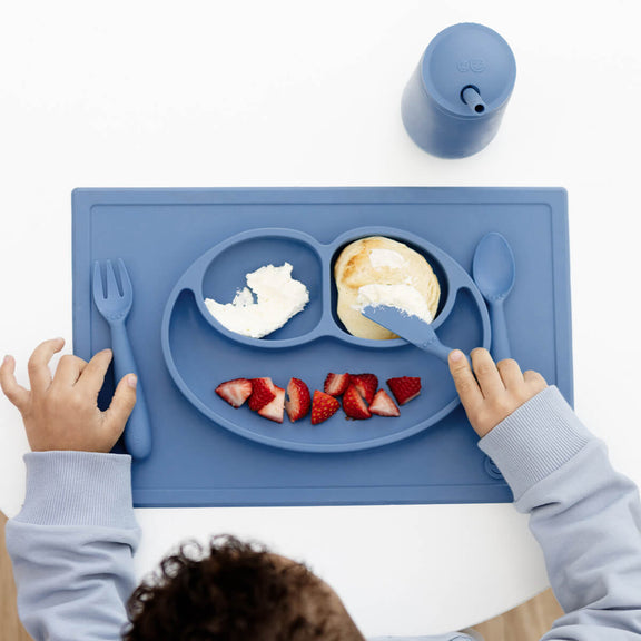 ezpz Happy Feeding Set in Indigo / Silicone, Self-Suctioning Plate, Silicone Cup and Straw, Training Utensils for Toddlers #color_indigo