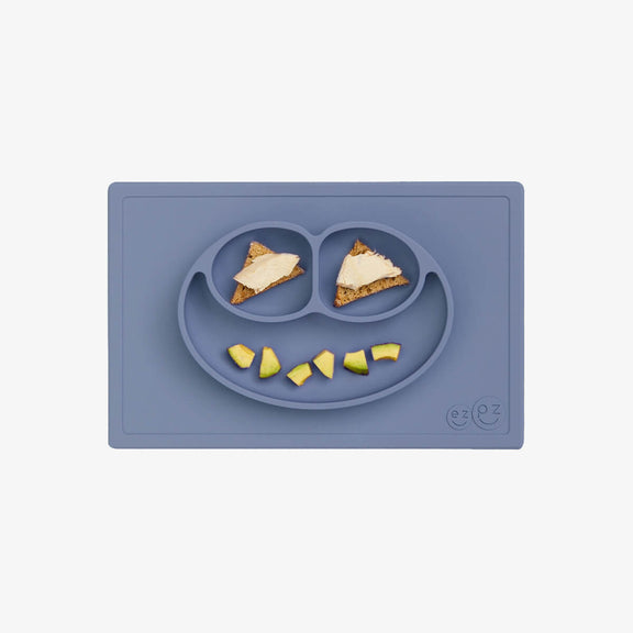 Happy Mat in Indigo by ezpz / The Original All-In-One Silicone Plates & Placemats that Stick to the Table #color_indigo