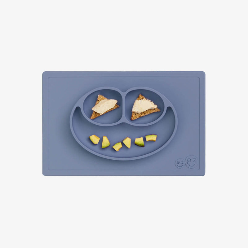 Happy Mat in Indigo by ezpz / The Original All-In-One Silicone Plates & Placemats that Stick to the Table #color_indigo