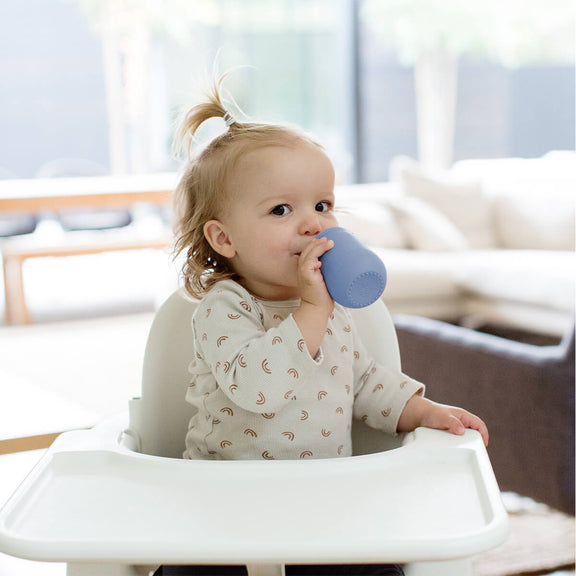 The Mini Cup + Straw in Indigo by ezpz / Silicone Drinking Cup and Straw Training System for Toddlers #color_indigo