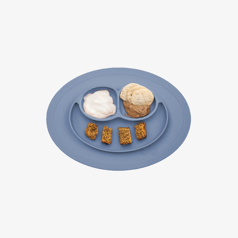 The Mini Mat in Indigo by ezpz / Self-Suctioning Silicone Plate + Placemat #color_indigo