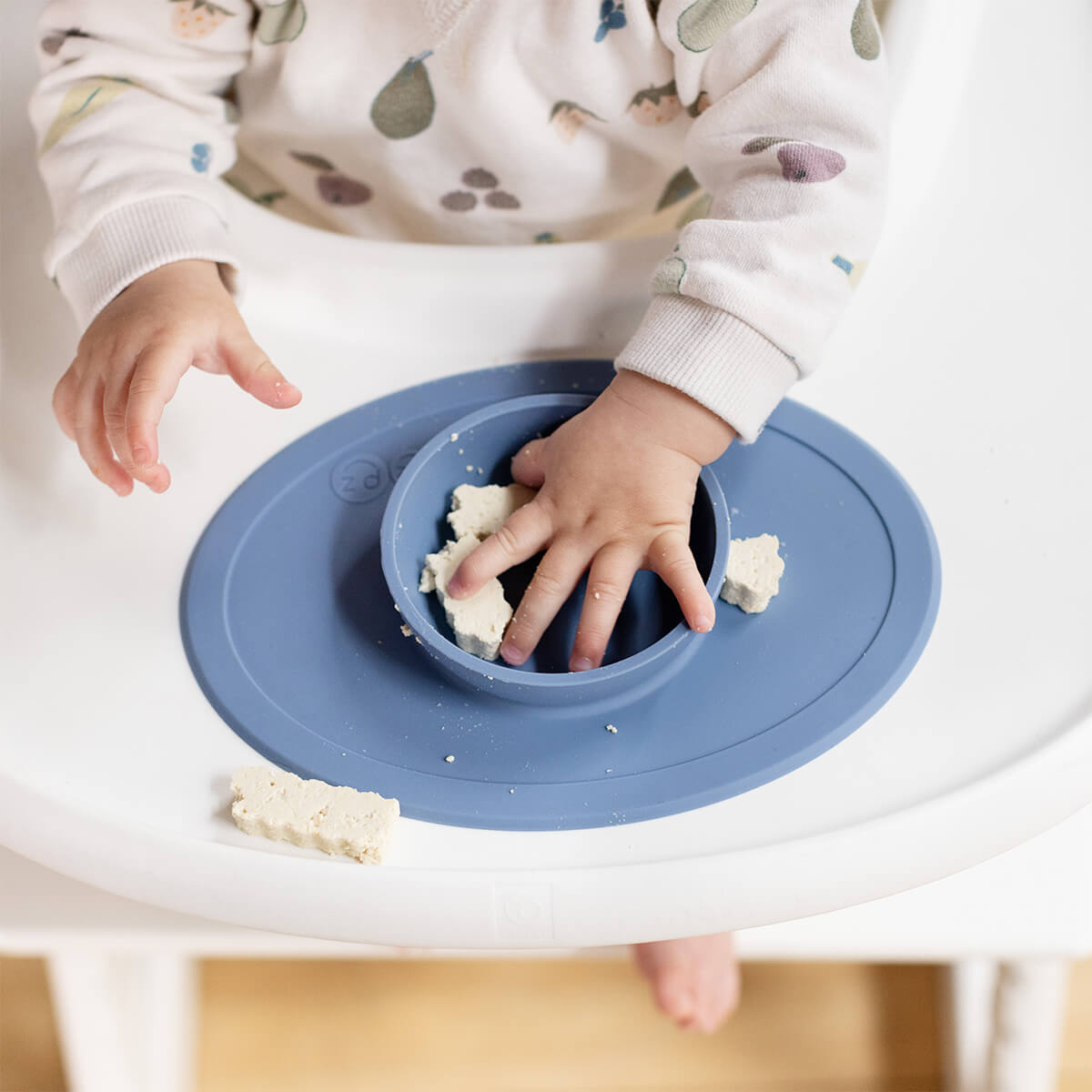 The Tiny Bowl in Indigo by ezpz / Silicone Bowl for Babies that Fits on High Chairs #color_indigo