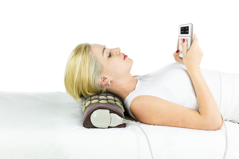 Jade and tourmaline gemstones provide targeted pressure for tension relief